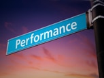 Road sign with the word PERFORMANCE written on it