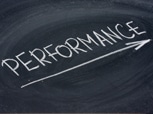 Black board with the word PERFORMANCE written on it